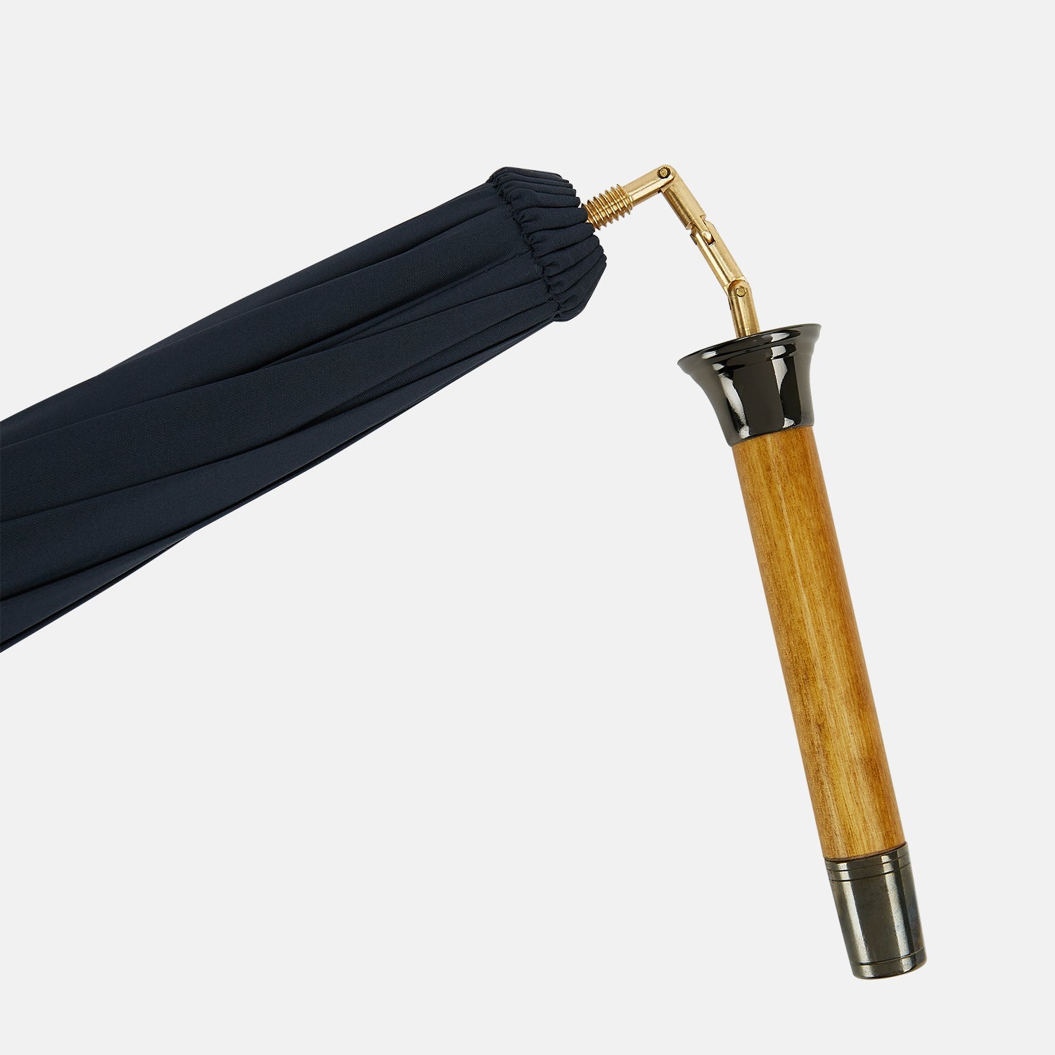 View 4 of product The Turnbull & Asser Navy Traveller Umbrella features a Malacca crook handle and is shown open against a plain white background.