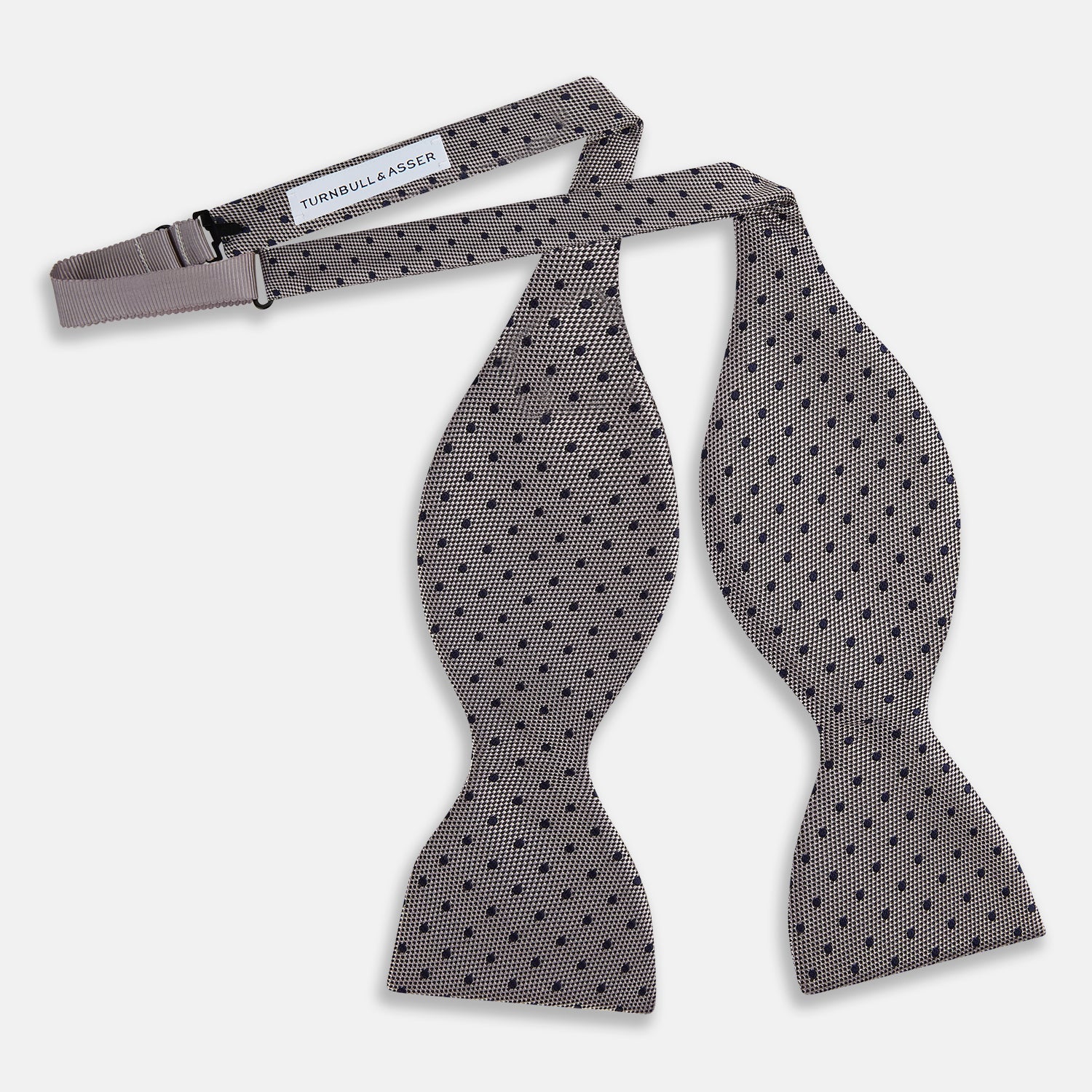 View 3 of product The Turnbull & Asser Navy and Silver Micro Dot Silk Bow Tie, featuring a refined dot pattern, is displayed on a white background.