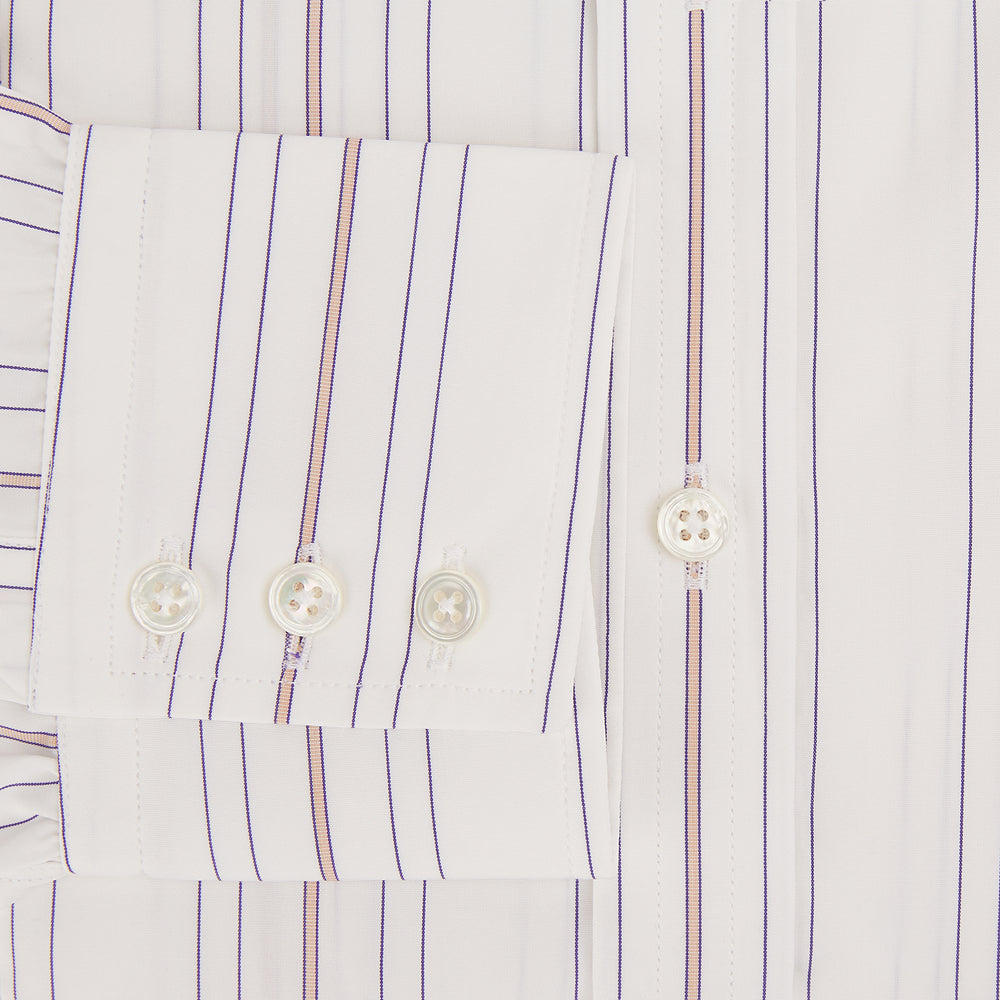 The Purple and Rose Multi Stripe Mayfair Shirt by Turnbull & Asser features thin blue, red, and gray stripes on white, a classic collar, and long sleeves. This British design is displayed on a plain white surface.
