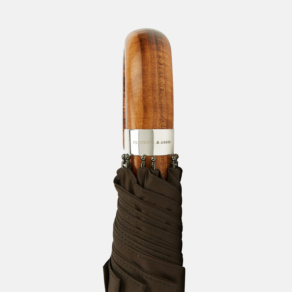 The Turnbull & Asser Brown Telescopic Umbrella features a brown maple crook handle and a metal shaft, shown open against a plain white background.