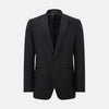 View 3 of product The Turnbull & Asser Black Single Breasted Dinner Suit features fine wool, a satin shawl collar jacket, and matching trousers—perfect formal wear, shown on a plain white background.