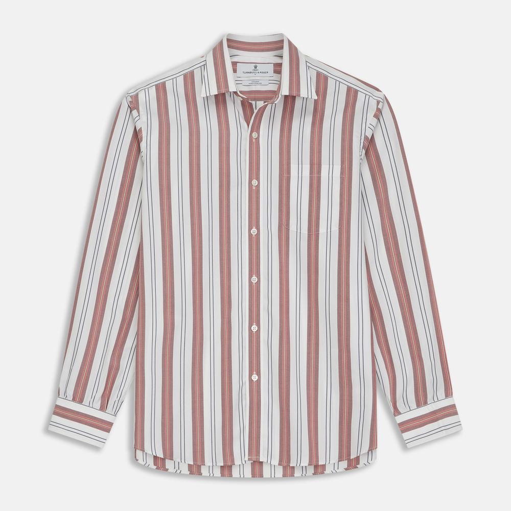 A close-up of Turnbull & Asser’s Red, Blue & White Stripe Cotton Fabric is displayed within a circular frame on a light gray background, showcasing its diagonal white, navy blue, red, and beige stripes.