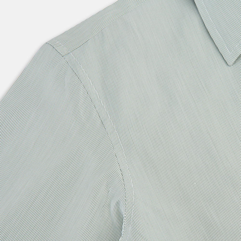 A dark green hairline stripe Westminster shirt by Turnbull & Asser, featuring long sleeves, a classic collar, tailored fit, white front buttons, and buttoned cuffs, laid flat on a white background.
