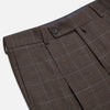 View 5 of product The Turnbull & Asser Brown Check Arthur Trousers feature a straight leg, button and zip closure, belt loops, and front pleats, shown against a plain white background.