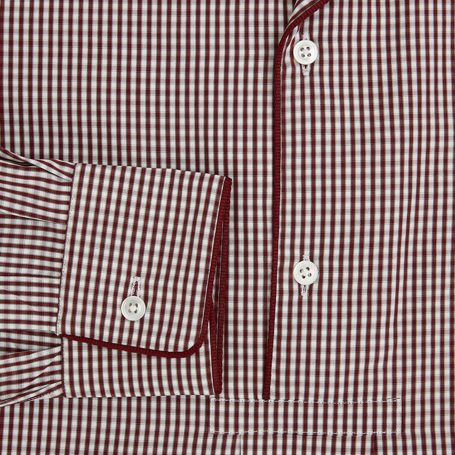 View 4 of product The Turnbull & Asser Burgundy Micro Check Winston Long Nightshirt is knee-length with long sleeves, brown and white micro checks, a collar, chest pocket with piping, and a front button placket.
