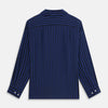 View 5 of product The Turnbull & Asser Navy and Blue Multi Stripe Silk Holiday Fit Winnington Shirt features white buttons, a notched collar, and a chest pocket, shown laid flat on a white background.