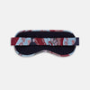 View 4 of product The Blue Bloomsbury Jacquard Cashmere Lined Sleep Mask and Bag by Turnbull & Asser features a blue and red abstract floral pattern, elastic strap, and is shown on a plain white background.