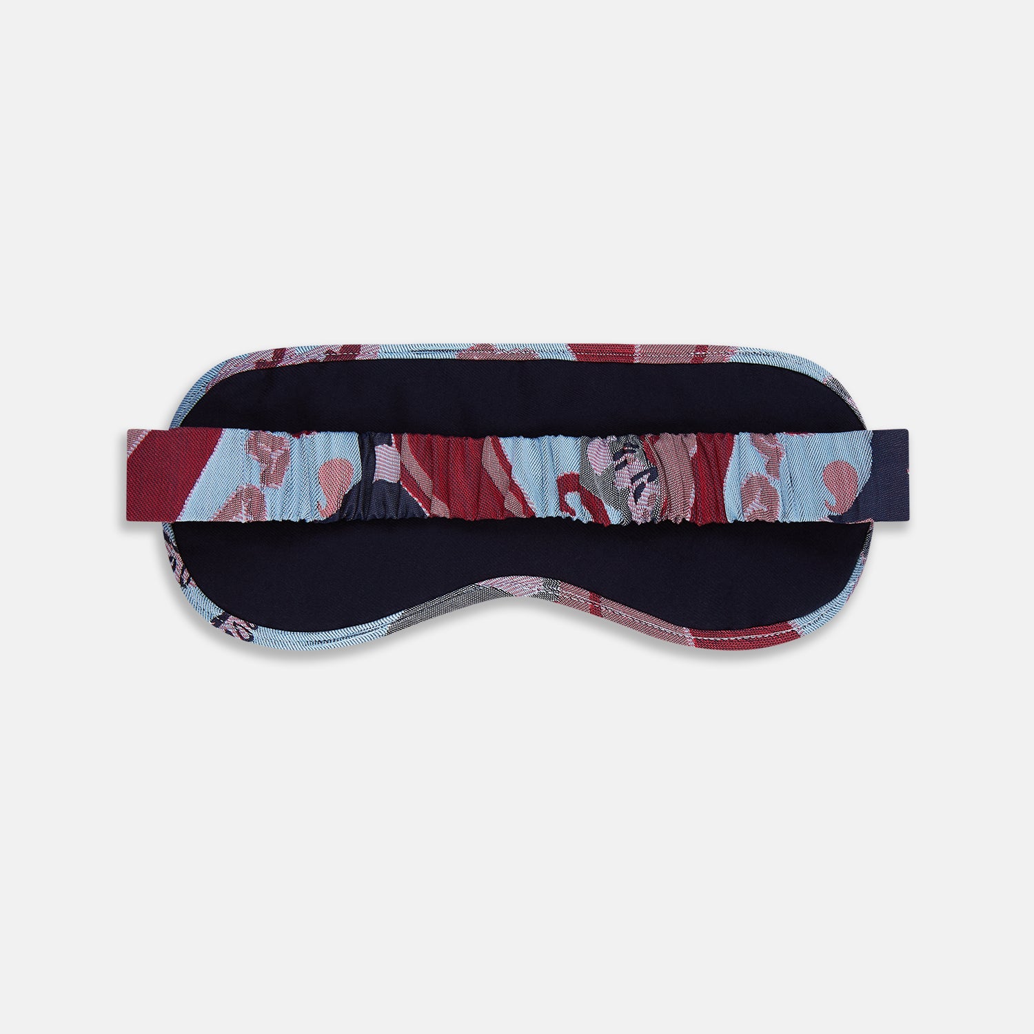 View 4 of product The Blue Bloomsbury Jacquard Cashmere Lined Sleep Mask and Bag by Turnbull & Asser features a blue and red abstract floral pattern, elastic strap, and is shown on a plain white background.