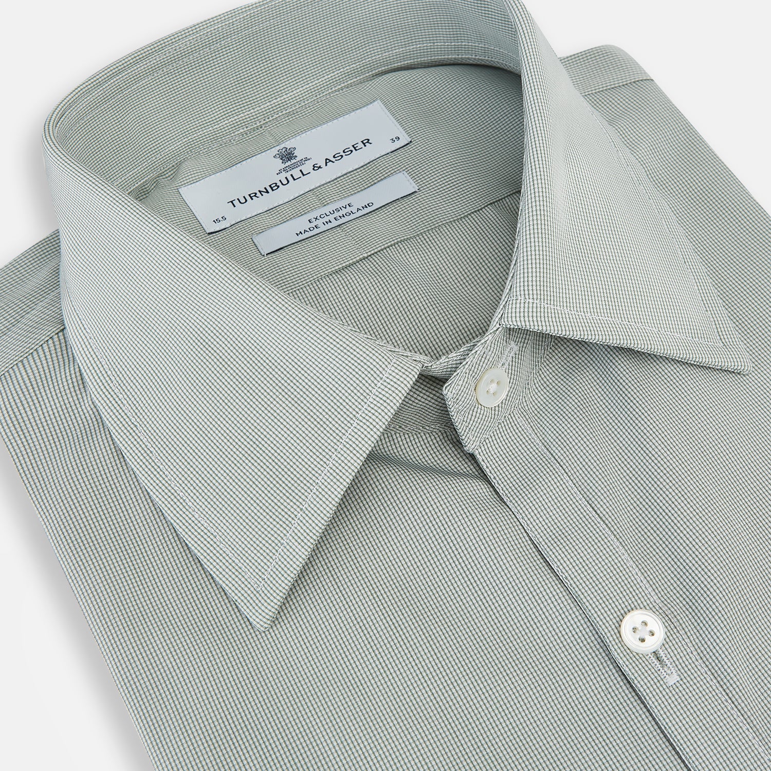 View 2 of product A dark green micro graph check Westminster shirt by Turnbull & Asser, featuring fine British craftsmanship, a Turnbull collar, and white buttons, is laid flat on a white background.