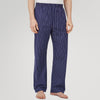 View 2 of product Turnbull & Asser Navy Stripe Modern Pyjama Trousers in superfine cotton with white stripes, elastic waistband, and relaxed fit, presented against a plain white background.