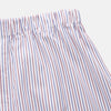 View 2 of product The Turnbull & Asser Red and Blue Stripe Cotton Hastings Pyjama Trousers feature a loose fit with an elastic waistband for comfort, showcasing bold red and blue stripes on soft cotton, displayed against a plain white background.