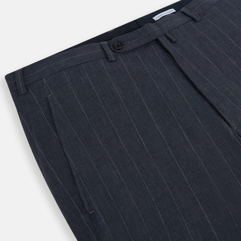 The Navy Striped Edmund trousers by Turnbull & Asser have a relaxed, straight-leg fit with front pleats, belt loops, and a single button waist closure, shown against a plain white background.