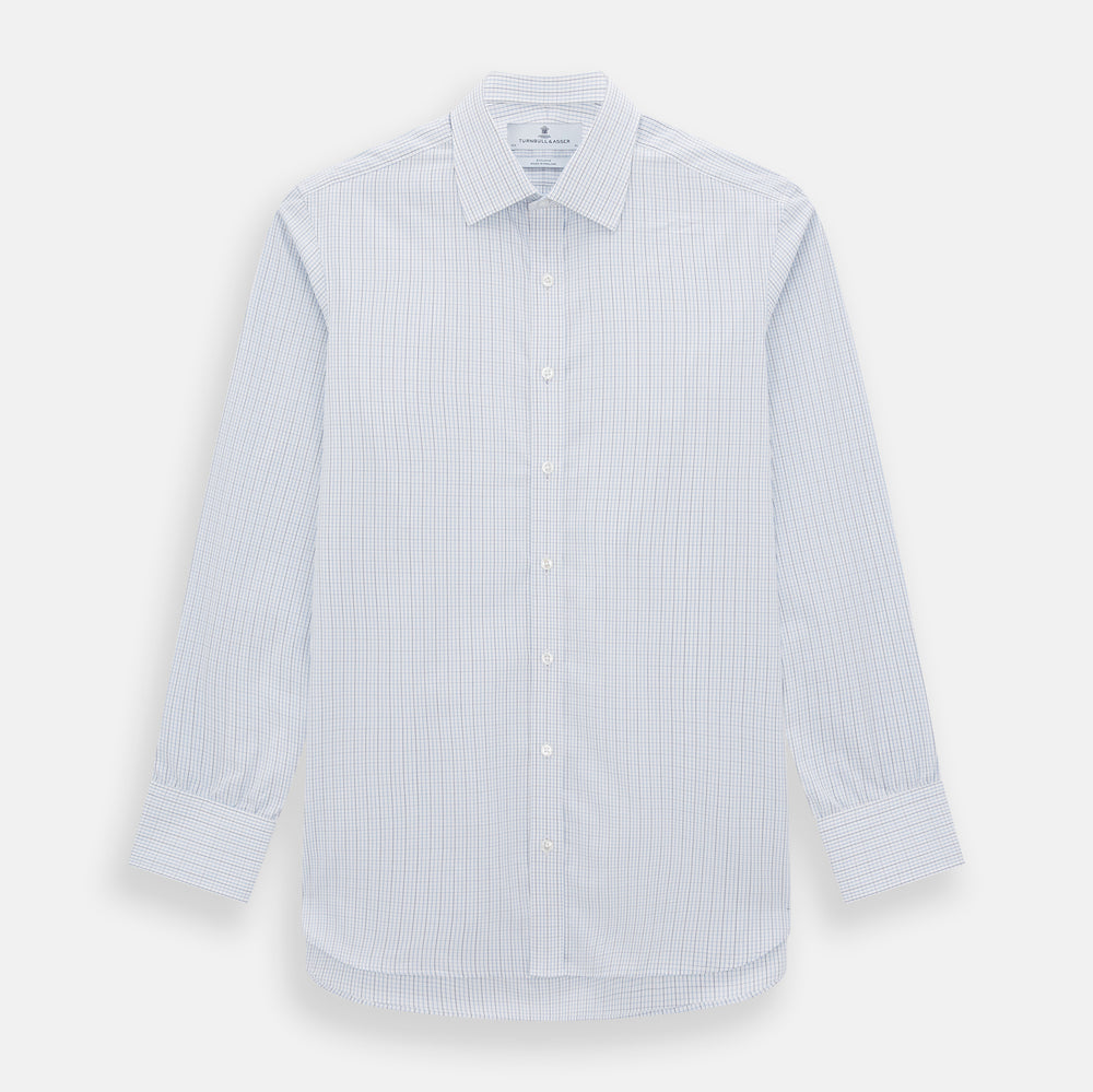 The Turnbull & Asser Pale Blue and Navy Grid Check Mayfair Shirt is a long-sleeve, button-up shirt made from fine Italian cotton, featuring a pointed collar and buttoned cuffs, shown against a plain white background.