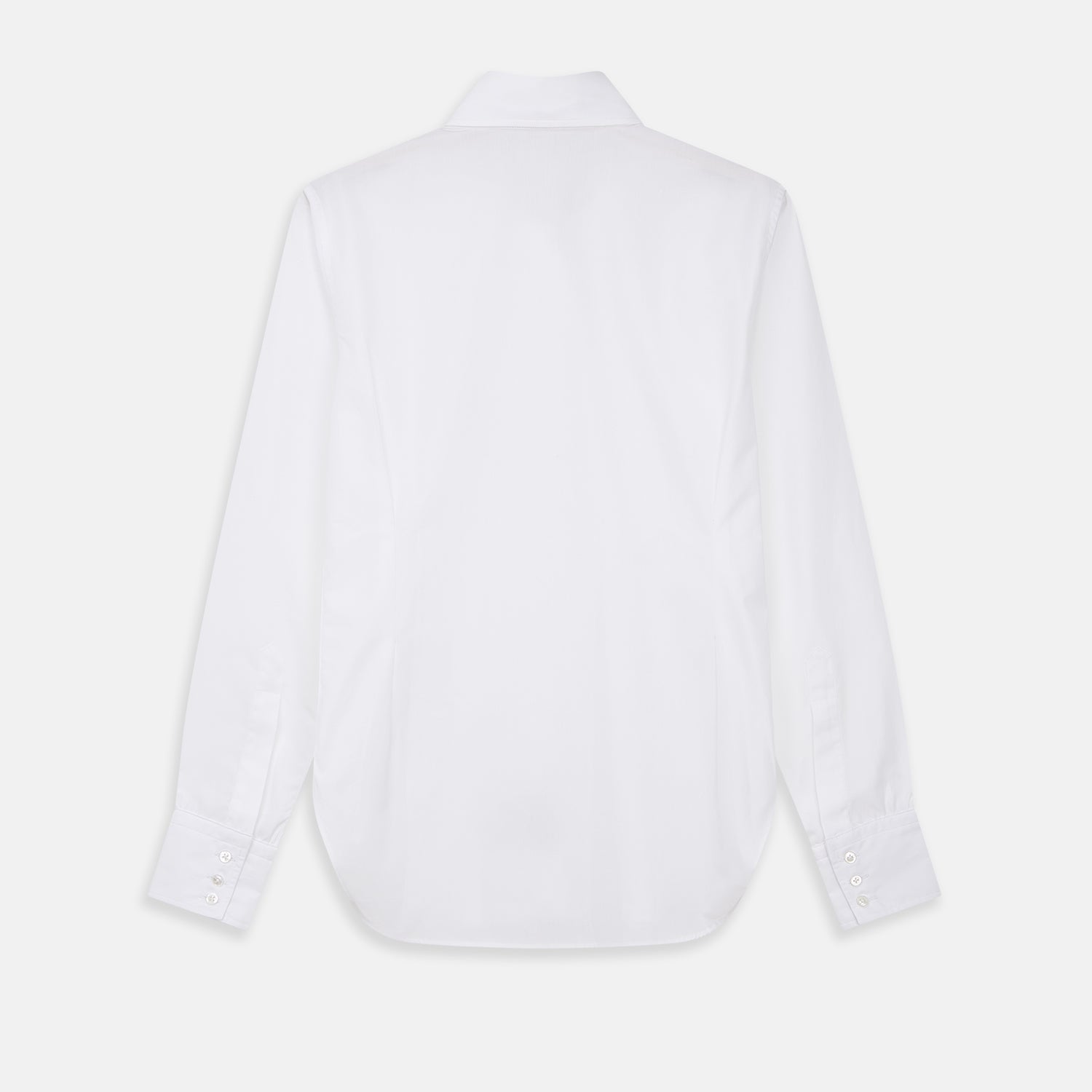 View 10 of product The White Cotton Lauren Shirt by Turnbull & Asser, featuring a stand collar, button-down front, and elongated body, is laid flat on a plain white background.