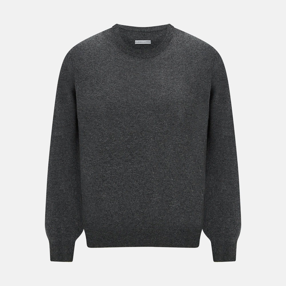 The Turnbull & Asser Charcoal Grey Cashmere Round Neck Jumper features a crew neck, long sleeves, and ribbed cuffs, collar, and hem—an essential piece of men’s knitwear displayed on a white background.