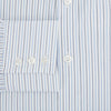 View 4 of product The Turnbull & Asser Navy and Blue Shadow Stripe Mayfair Shirt, featuring a classic T&A collar and buttoned cuffs, is laid flat on a white background.