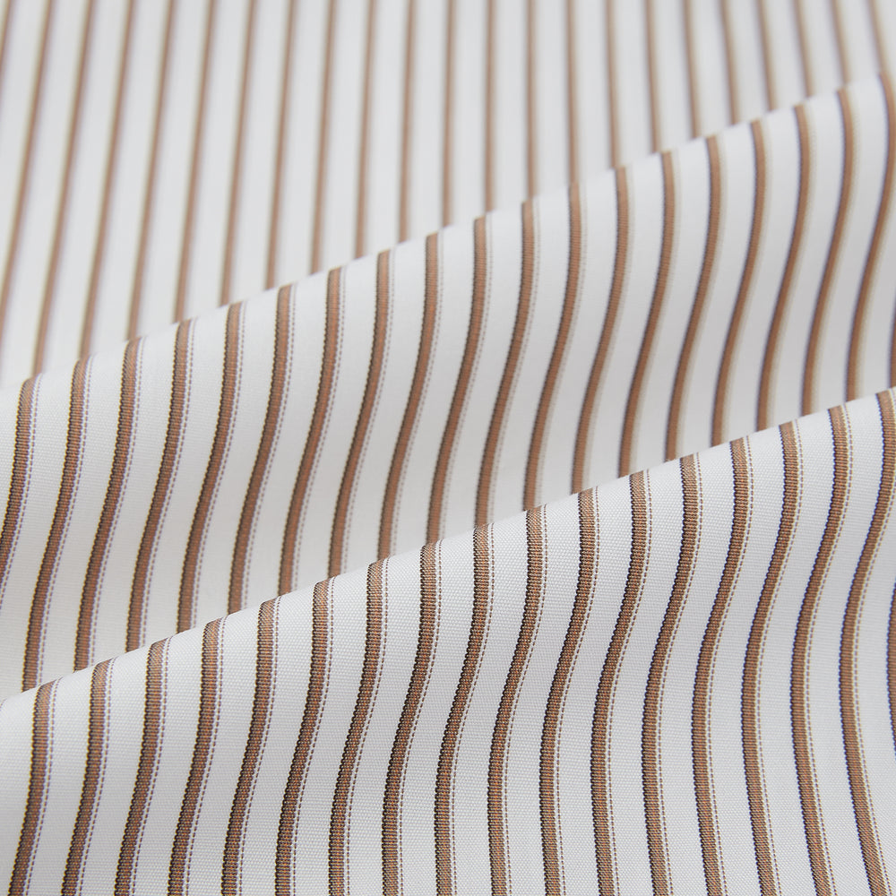 The Coffee Shadow Stripe Mayfair Shirt by Turnbull & Asser is a long-sleeve, button-down style with a T&A collar and fine beige and white stripes, crafted from premium Italian cotton and shown on a white background.