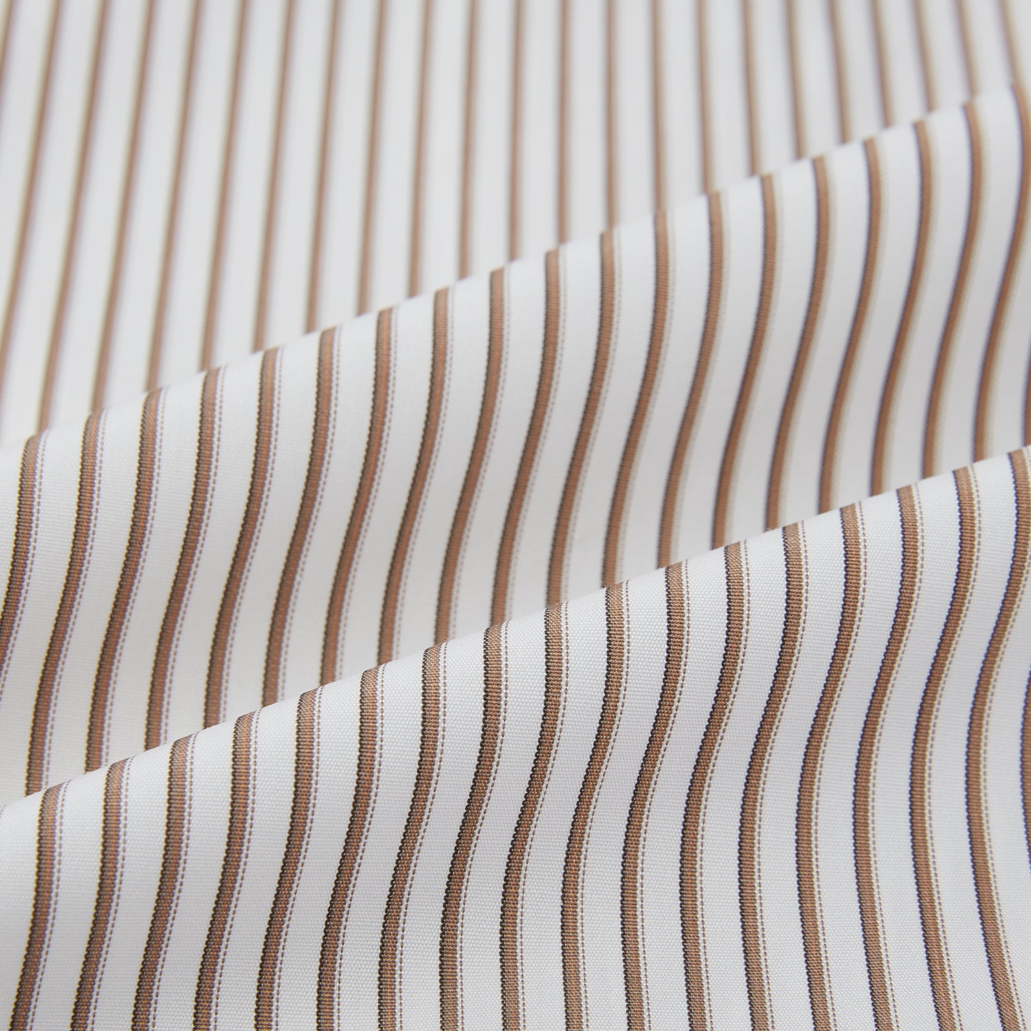 View 6 of product The Coffee Shadow Stripe Mayfair Shirt by Turnbull & Asser is a long-sleeve, button-down style with a T&A collar and fine beige and white stripes, crafted from premium Italian cotton and shown on a white background.