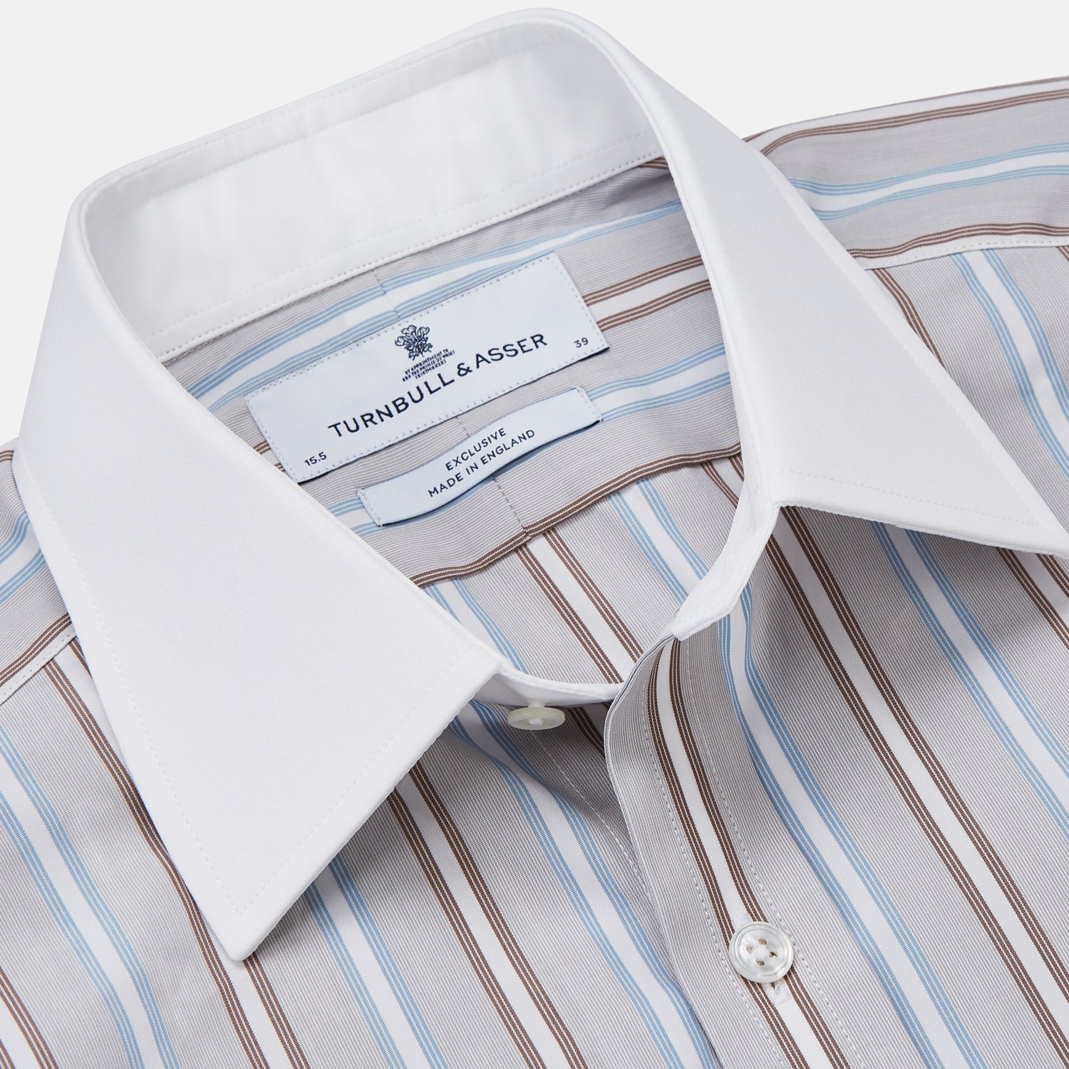 View 2 of product Turnbull & Asser's Beige Multi Stripe Cotton Regular Fit Penrose Shirt features blue, beige, and white vertical stripes with a crisp white collar and cuffs. Displayed on a plain background.