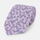 The Turnbull & Asser Multi-coloured Circle Lilac Silk Tie features overlapping blue, purple, and white circles on fine English silk—ideal for elevating smart outfits. Shown rolled against a plain white background.