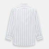 View 3 of product The Turnbull & Asser Antique Pink Track Stripe Mayfair Shirt is a white, long-sleeved Italian cotton shirt with vertical pink stripes, a spread collar, and buttoned cuffs, shown laid flat on a white background.