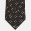 View 3 of product The Turnbull & Asser White and Brown Micro Dot Silk Tie features a refined micro dot pattern—an essential accessory for any men's wardrobe.