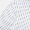 View 6 of product The Dark Navy Double-Pinstripe Westminster Shirt by Turnbull & Asser, featuring a Turnbull collar and cuffed sleeves, is displayed laid flat on a plain white background, highlighting its British craftsmanship.