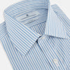 View 2 of product The Turnbull & Asser Sky Blue Double Stripe Mayfair Shirt features sky blue and white vertical stripes, a T&A collar, buttoned cuffs, and is displayed flat on a white background.