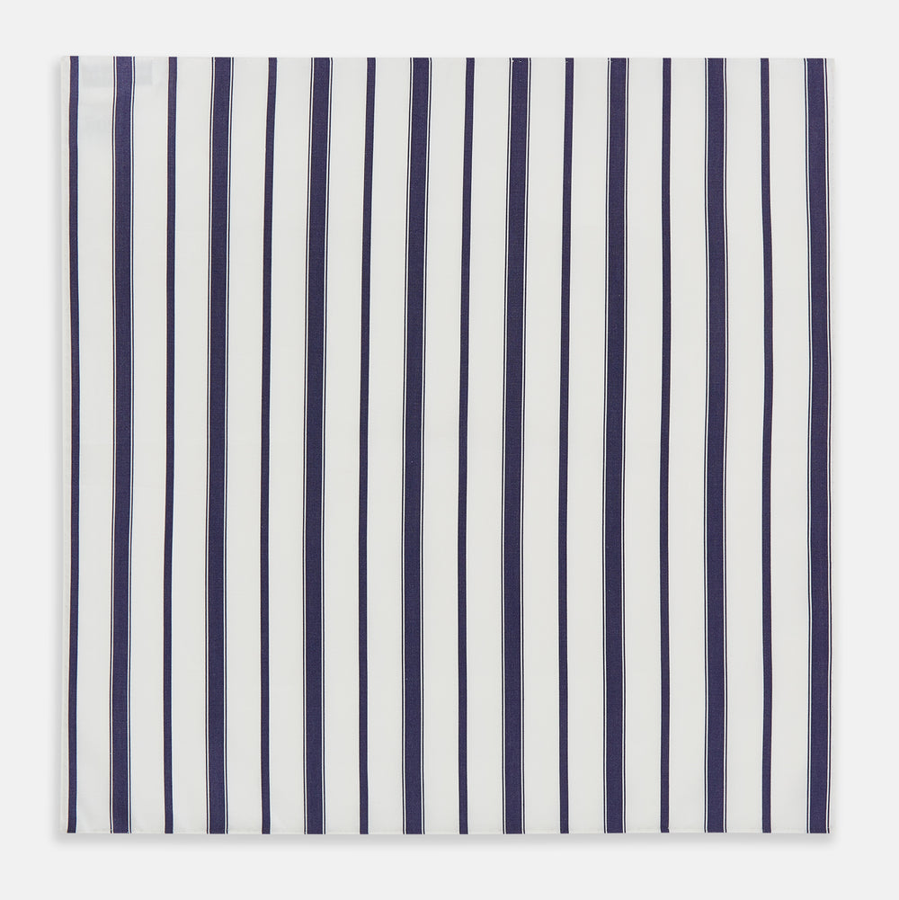 The Navy Double Stripe Hand-Rolled Handkerchief by Turnbull & Asser features evenly spaced navy and black stripes on white fabric, meticulously crafted in England with hand-rolled edges.