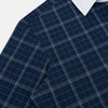 View 6 of product The Turnbull & Asser Indigo Windowpane Check Windsor Shirt features a contrast T&A collar and cuffs, highlighting British craftsmanship. It is displayed flat on a white background.