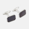 View 1 of product The Turnbull & Asser Navy Checkered Rectangular Enamel Cufflinks feature dark blue enamel faces with a gold grid pattern, blending masculine elegance with timeless style.