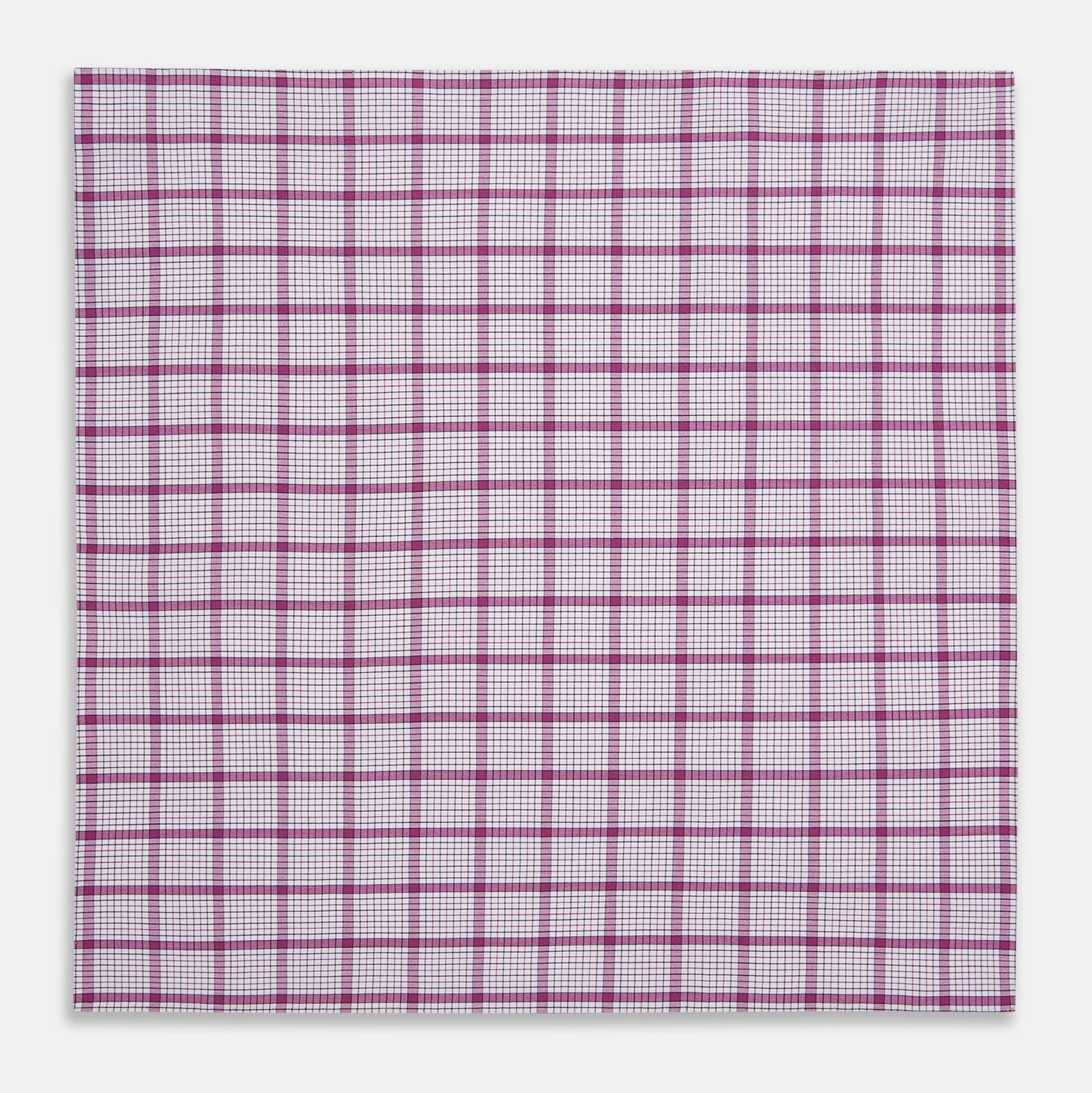 View 3 of product The Turnbull & Asser Hand Rolled Purple Graph Overlay Check Handkerchief is a white cotton accessory featuring intersecting purple and pink lines that create evenly spaced squares across the fabric.