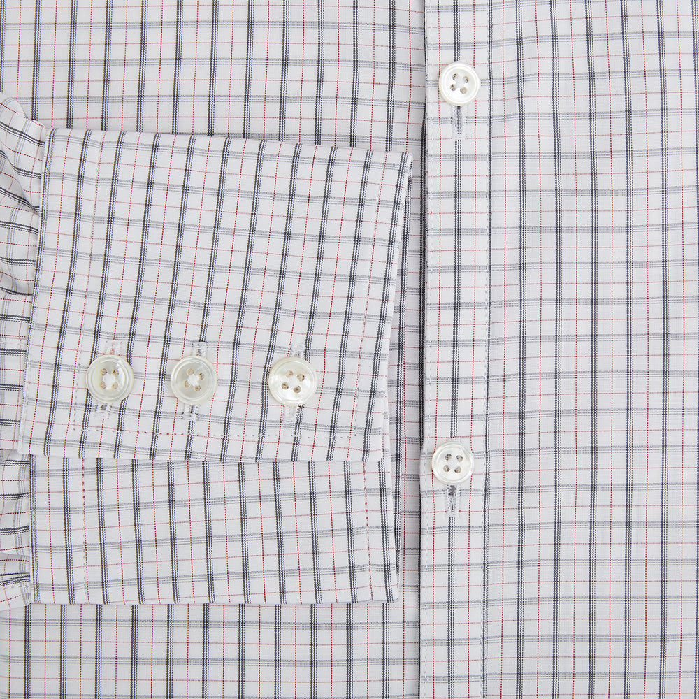 The Blue and Red Graph Check Westminster Shirt by Turnbull & Asser features a classic collar, long sleeves, and British craftsmanship, with a blue and red checkered pattern on white, displayed flat on a white surface.