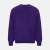 View 3 of product The Turnbull & Asser Purple Merino V-Neck Jumper features long sleeves and a rich, solid hue, making it an essential knitwear piece for any wardrobe.