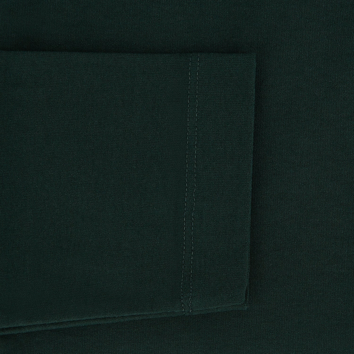 View 4 of product A forest green long-sleeve crewneck t-shirt by Turnbull & Asser is laid flat on a white background, showing the front side with no visible patterns or logos—a timeless, versatile staple.