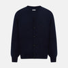 View 1 of product The Turnbull & Asser Navy Fine Merino V-Neck Cardigan features long sleeves, ribbed cuffs and hem, and is crafted from premium yarn for comfort and style, shown on a white background.