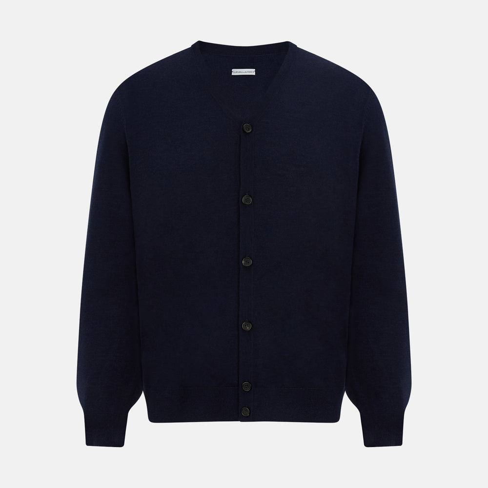 The Turnbull & Asser Navy Fine Merino V-Neck Cardigan features long sleeves, ribbed cuffs and hem, and is crafted from premium yarn for comfort and style, shown on a white background.