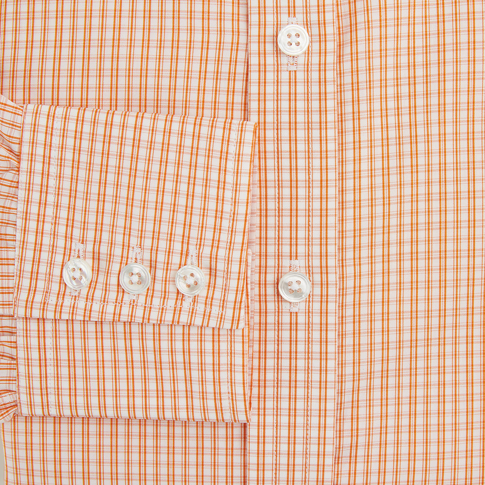 The Turnbull & Asser Orange Micro Check Mayfair Shirt, a long-sleeve button-up with a classic T&A collar and white-orange micro check pattern, is shown neatly laid flat on a white background.