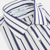 View 2 of product The Navy Double Stripe Mayfair Shirt by Turnbull & Asser features classic long sleeves, buttoned cuffs, a collar, and a slightly curved hem with timeless vertical navy and white stripes.