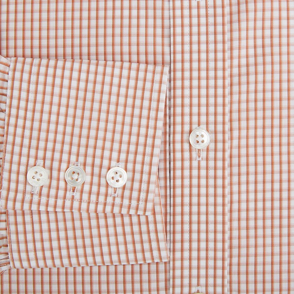 The Orange Micro Shadow Check Mayfair Shirt by Turnbull & Asser features a T&A collar, button-down front, and buttoned cuffs; crafted from Italian cotton in an orange and white check pattern, laid flat on a white background.