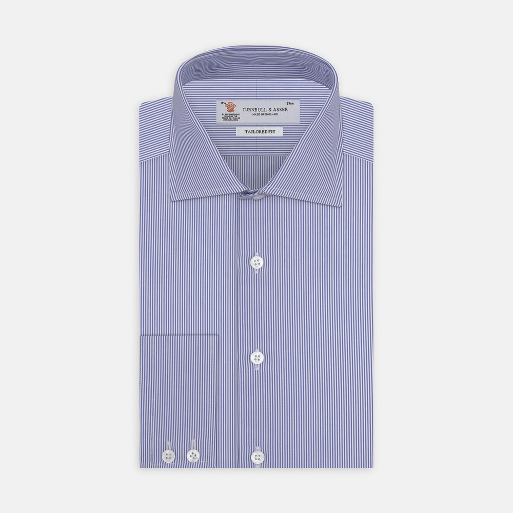 The Turnbull & Asser Tailored Fit Blue Fine Bengal Stripe Shirt features a Kent collar, 2-button cuffs, and is displayed neatly folded on a white background.