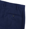 View 2 of product Turnbull & Asser Blue Wool Trousers feature a tailored fit, button and zip closure, front creases, and belt loops, shown on a flat white background.