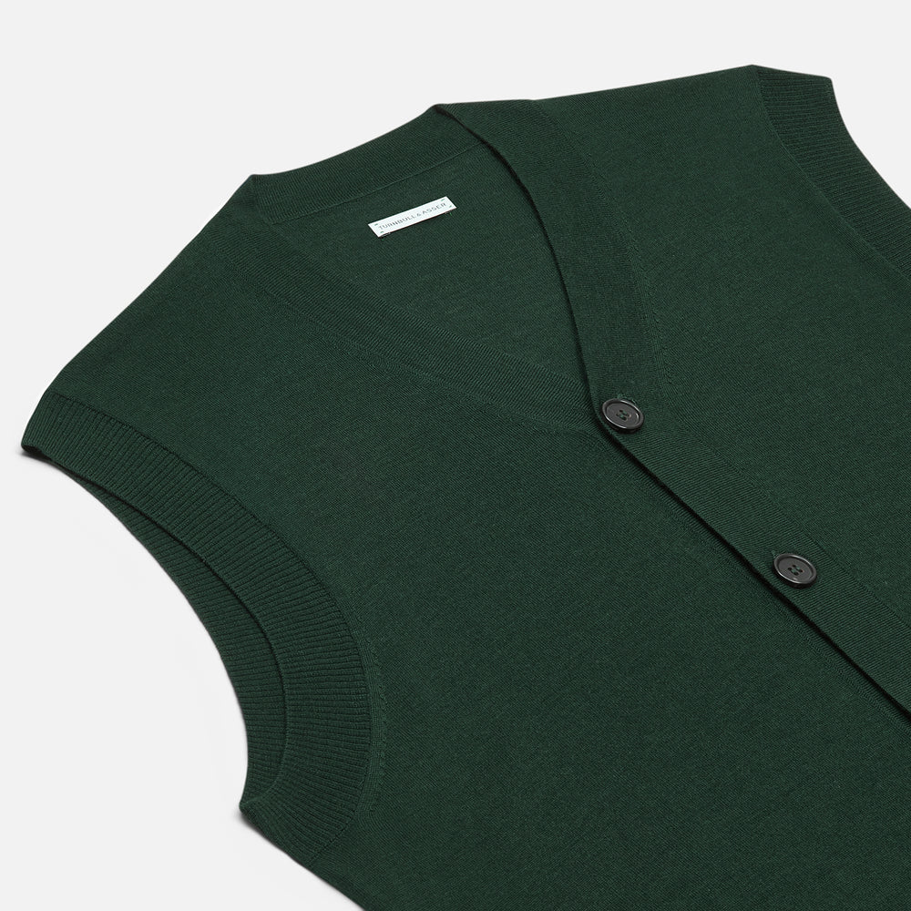 The Turnbull & Asser Forest Green Fine Merino V-Neck Sleeveless Cardigan features front buttons and two small pockets, shown against a white background.
