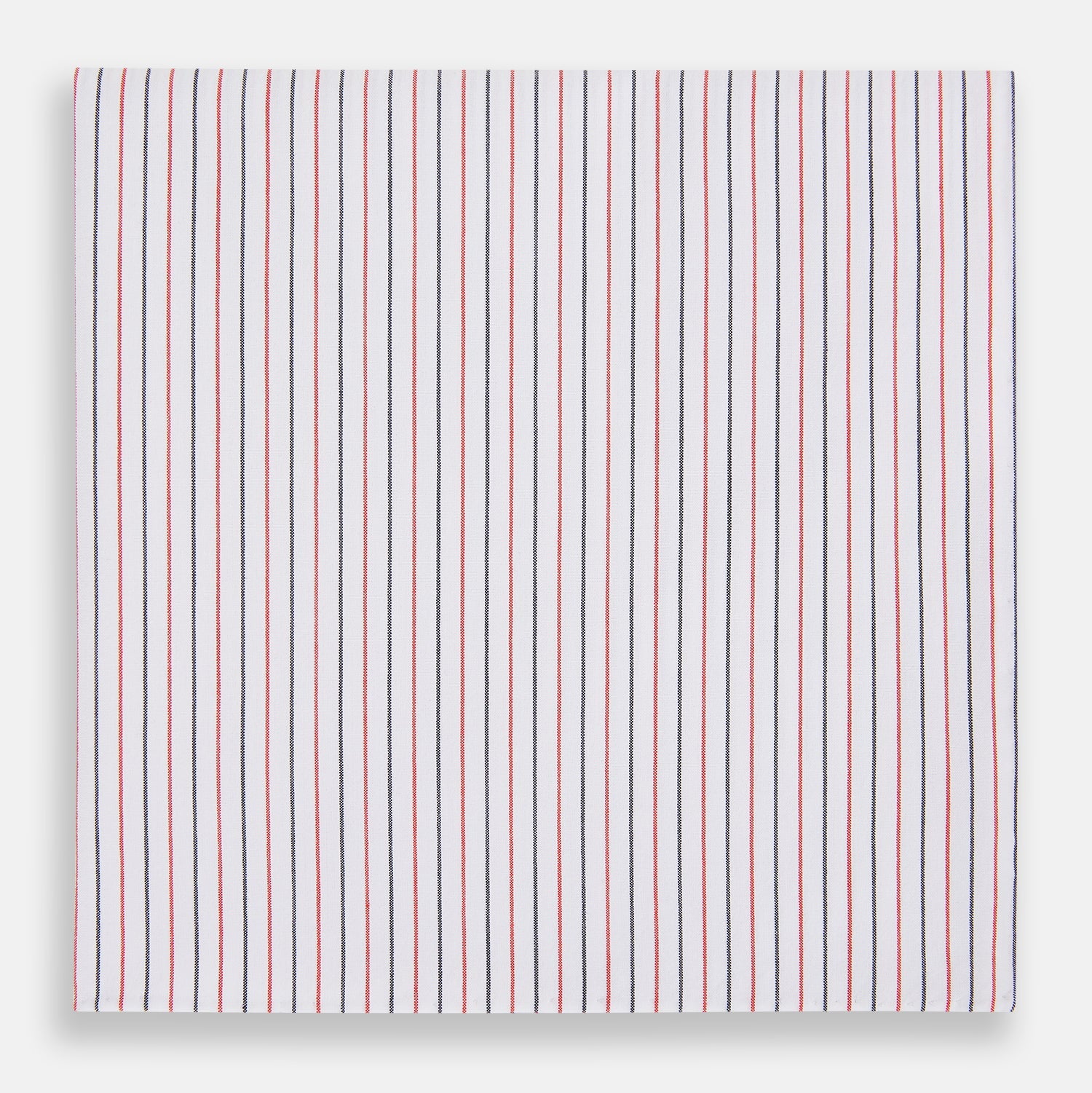 View 1 of product The Turnbull & Asser Hand Rolled Red and Navy Pinstripe Handkerchief features evenly spaced vertical stripes on white cotton, offering a clean, classic look as an elegant gentleman's accessory or stylish pocket square.