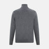 View 3 of product The Turnbull & Asser Slate Grey Melange Half-Zip Cashmere Jumper features a high collar and long sleeves, crafted from premium knitwear, and is shown against a plain white background.