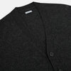 View 2 of product The Turnbull & Asser Dark Grey Melange Cashmere Cardigan features long sleeves, ribbed cuffs and hem, and two front pockets, shown on a plain white background.