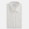 View 4 of product The Turnbull & Asser Yellow Double Pinstripe Mayfair Shirt, a long-sleeved, button-up with thin blue and yellow stripes on white, classic T&A collar, and buttoned cuffs, is laid flat on a white surface.