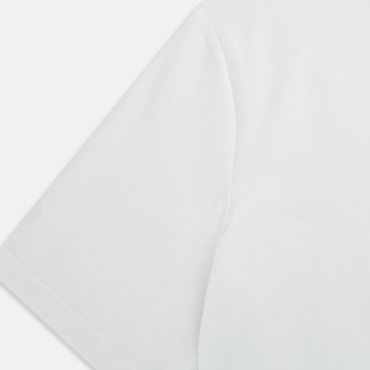 View 4 of product The Turnbull & Asser White Short-sleeve Fitted T-Shirt is a classic, logo-free crew neck laid flat on a white background—perfect for smart casual looks.
