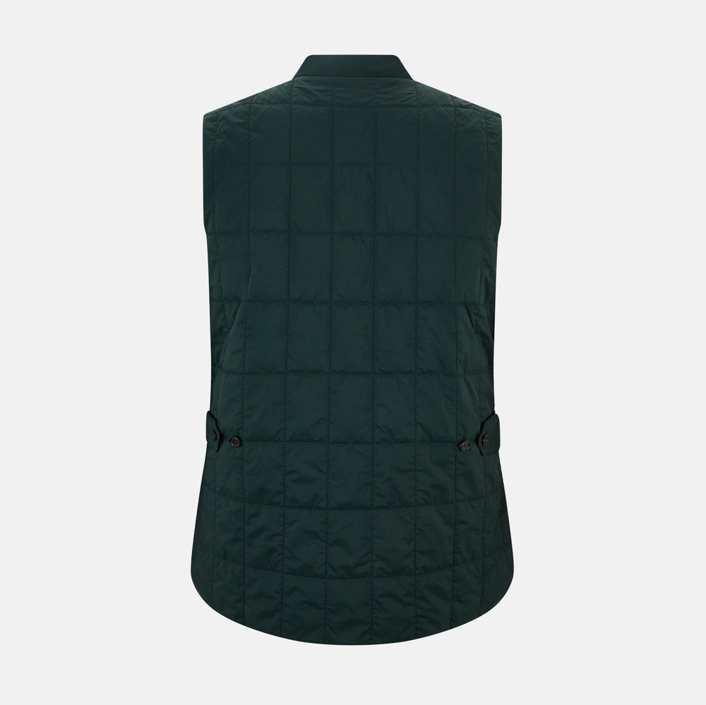 Turnbull & Asser Forest Green Quilted Gilet features a front zipper, two zippered side pockets, and a small chest pocket. Shown against a white background, it's a stylish lightweight layer for any season.