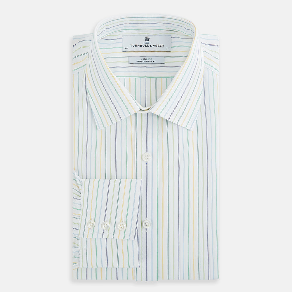 The Turnbull & Asser Multi Tone Double Pinstripe Mayfair Shirt is a long-sleeve pure cotton shirt with a collar and thin blue, green, and yellow double pinstripes on a white background.